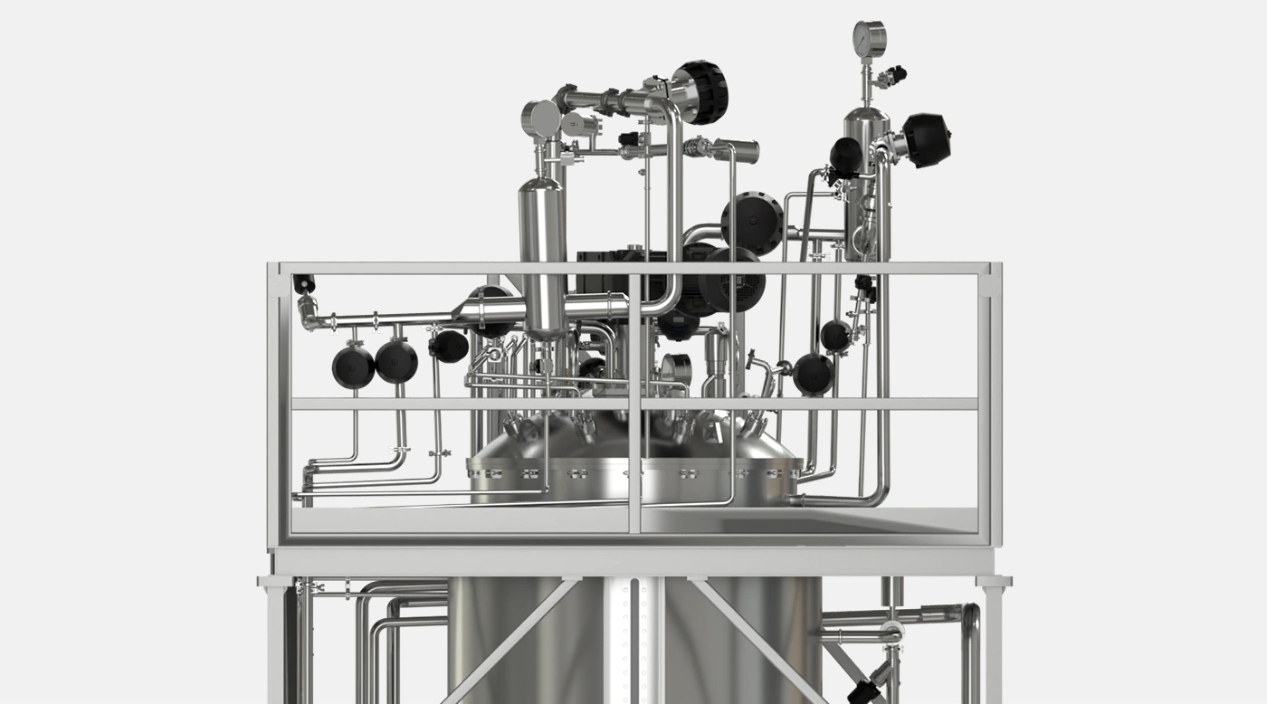 A top view of a TECNIC ePROD bioreactor, showcasing its sleek stainless steel vessel, and various ports and connections. The bioreactor's large capacity and robust construction are evident, highlighting its suitability for large-scale biomanufacturing applications.