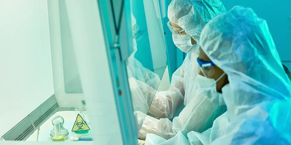 People researching biotechnology advances in the laboratory